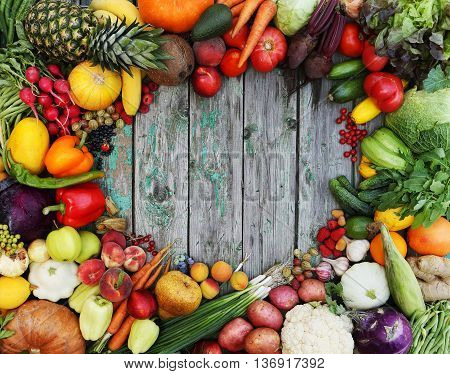 Healthy food background. Studio photo of different fruits on wooden table.