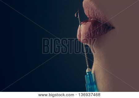 Woman With Syringe In Hand