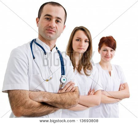 Arzt mit zwei Assistenten