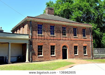 New Bern North Carolina - April 24 2016: Georgian brick Stables Wing at historic 1770 Tryon Palace