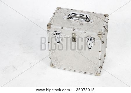 dirty aluminium box on dirty background for cinema production