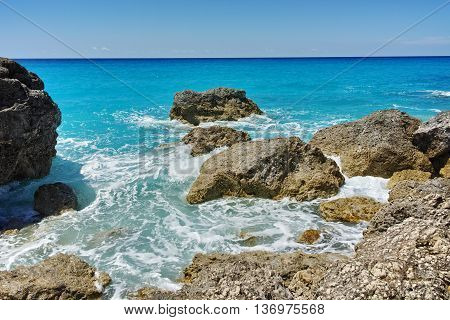 Big Rock in the blue waters of Megali Petra Beach, Lefkada, Ionian Islands, Greece