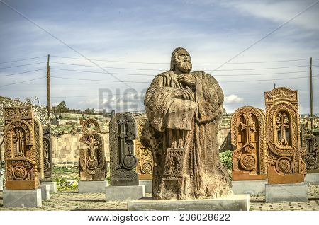 Oshakan,armenia,19 Februar,2018: Mesrop Mashtots Statue With Carved Stone Letters Of Armenian Alphab