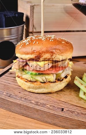 Top View Fresh Homemade Burger With Chicken, Salad, Cheese, Onion, Cucumber, Tomato, Sause And Dark 