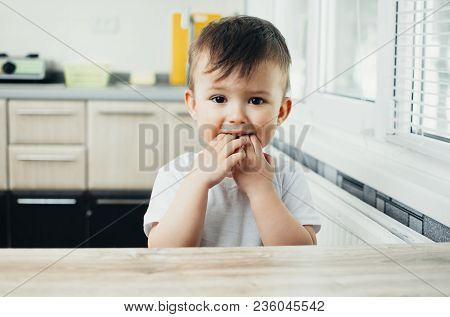 Boy Little Cute Fingers In Mouth Licking Bacteria And Germs, Hygiene Is Poor