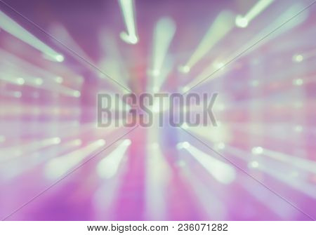 Aabstract Blurred Lights Trail On Pink Background Using Motion Zoom Burst Technique