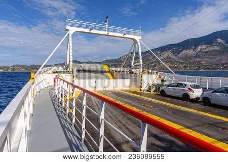 Cephalonia, Greece - September 30, 2017: Rear Side Of A Car Ferry. Cars Parked On Deck. Greece