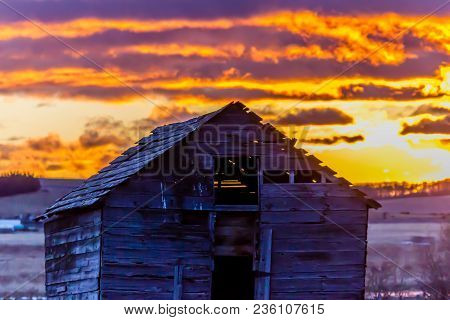 Stunning Sunrise Over A Rustic Out Building, Springbank, Alberta, Canada