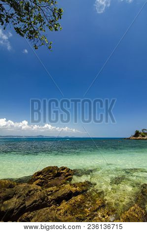 Hidden Beauty Of Kapas Island Located In Terenganu, Malaysia At Sunny Day. Blue Sky And Clear Sea Wa