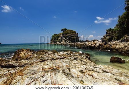 Hidden Beauty Of Kapas Island Located In Terenganu, Malaysia At Sunny Day. Blue Sky And Clear Sea Wa