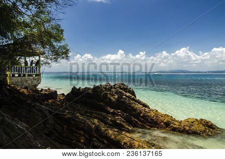 Hidden Beauty Of Kapas Island Located In Terenganu, Malaysia At Sunny Day. Blue Sky And Clear Sea Wa