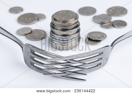 Conceptual Representation Of Financial Greed By Two Forks And Coins