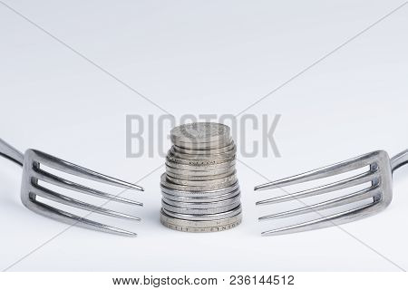 Conceptual Representation Of Financial Greed By Two Forks And Coins