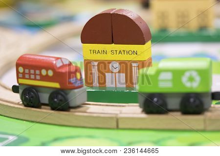 Two Train Wooden Toy With Train Station In Backdrop (selective Focused) Play Set Educational Toys Fo