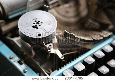 The Old Typewriter In Beams Of The Sun. In Natural Lighting, In Light From A Window. Retro Style. Ol