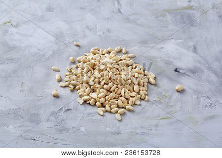 Pile Of Peelled Peanuts Isolated On White Textured Background, Background, Top View, Close-up, Selec