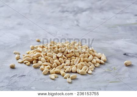 Pile Of Peelled Peanuts Isolated On White Textured Background, Background, Top View, Close-up, Selec