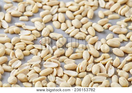 Pile Of Peelled Peanuts Isolated On White Textured Background, Background, Top View, Close-up, Selec