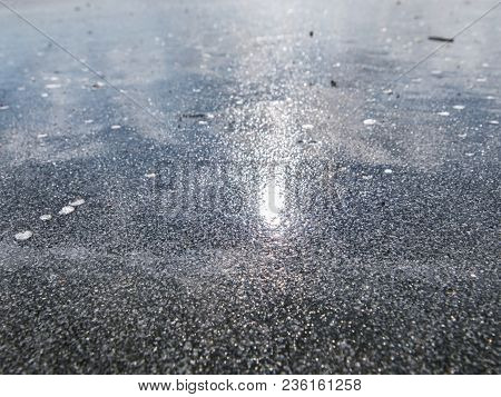 Big Piece Of Ice With Abstract Cracks Inside. Icicle Block Indetail With Frozen Bubbles And Rich Str