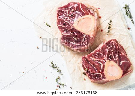 Raw Beef Steak Osso Bucco. Marble Meat. Top View With Copy Space On White Table.