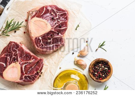 Raw Beef Steak Osso Bucco. Marble Meat. Top View With Copy Space On White Table.