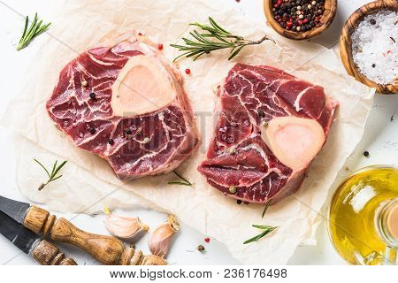 Raw Beef Steak Osso Bucco. Marble Meat. Top View On White Table.