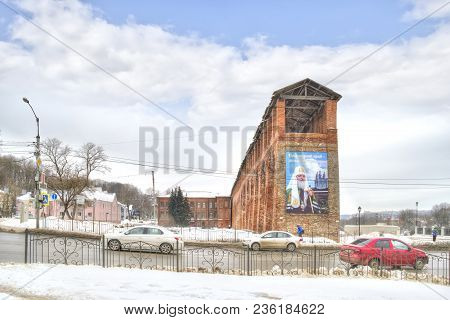 Smolensk, Russia - March 08.2018: The Fortress Wall And Poster With A Photograph Of The Patriarch Bo