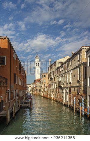 Canal In Venice Leading To The Saint George Of The Greeks (san Giorgio Dei Greci) Chuch With Its Cha