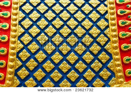 Texture tradizionale tailandese di fiori sul muro