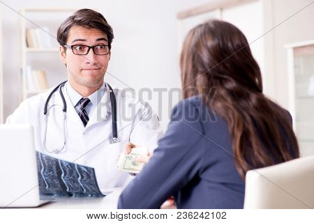 Doctor in corruption concept with being offered bribe