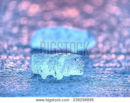 Ice Shard And Small Cracked Ice Pieces On Melring Glacier. Icy Fragments Are Melting On Flow Ice And