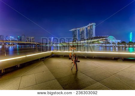 Marina Bay, Singapore - April 1 2018 : A  Bicycle Operated By Obike Are Parking With View Of Marina 