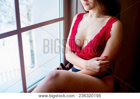 A Portrait Of A Beauriful Woman In A Lingerie