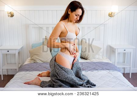 A Portrait Of A Beauriful Woman In A Lingerie