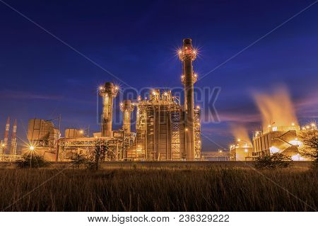 Gas Combine Electrical Power Plant At Dusk With Blue Sky Is Support All Factory In Industrial Estate