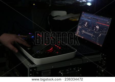 Dj Mixing Music On Console At The Night Club. Hand On A Sound Mixer Station. Mixer Equipment Enterta