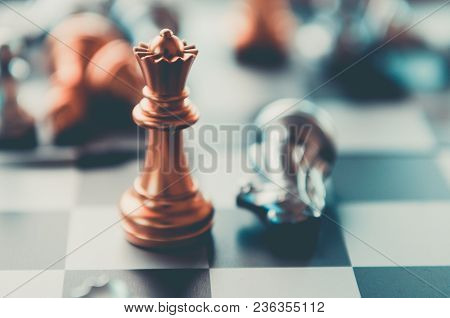 Silver And Gold Knight On Chess Board. Chess Knights Head To Head.business Concept Opponent In Busin