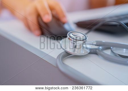 Healthcare And Medical Concept, Doctor's Working Seaching Information About Patient Database Through