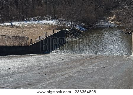 This Is A Spillway Off A Big Lake In A Park..