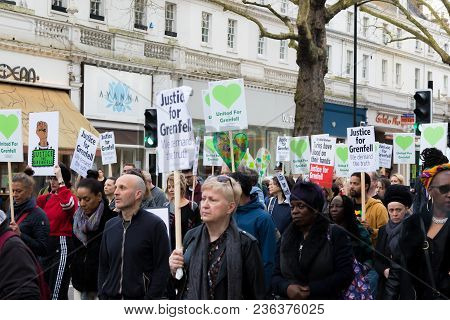 London, United Kingdom, 14th April 2018:- Marchers On A Silent March From Kensington Town Hall To Th