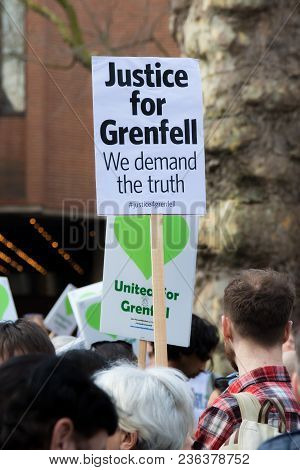 London, United Kingdom, 14th April 2018:- Marchers On A Silent March From Kensington Town Hall To Th