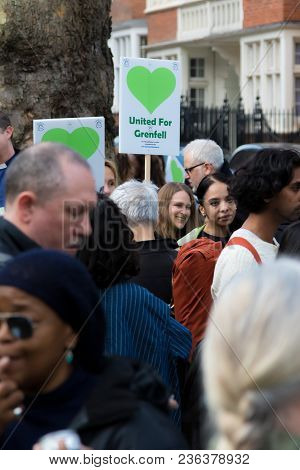 London, United Kingdom, 14th April 2018:- Marchers On A Silent March From Kensington Town Hall To Th