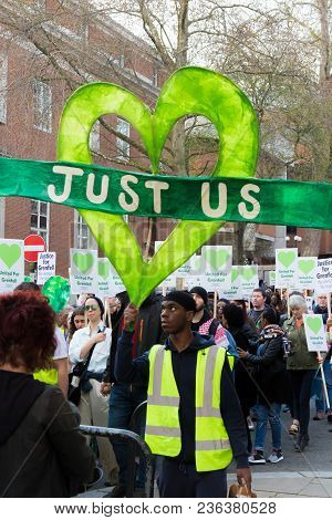 London, United Kingdom, 14th April 2018:- Marchers On A Silent March From Kensington Town Hall To Th