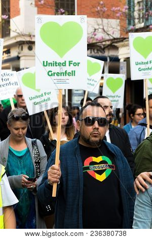 London, United Kingdom, 14th April 2018:- Marchers On A Silent March From Kensington Town Hall To Th
