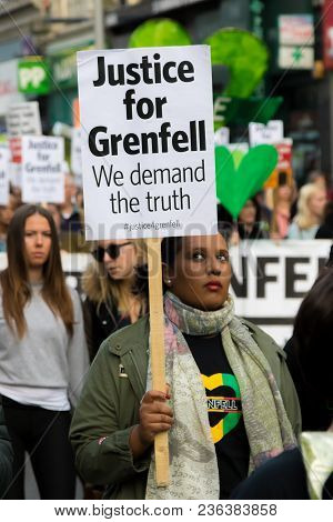 London, United Kingdom, 14th April 2018:- Marchers On A Silent March From Kensington Town Hall To Th