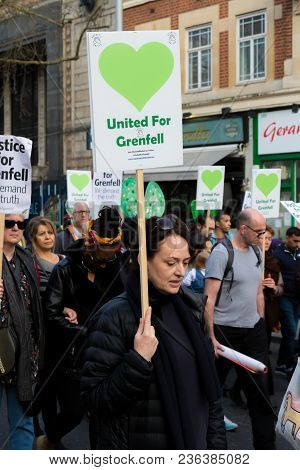 London, United Kingdom, 14th April 2018:- Marchers On A Silent March From Kensington Town Hall To Th