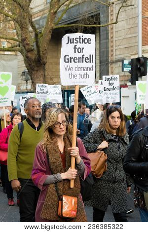 London, United Kingdom, 14th April 2018:- Marchers On A Silent March From Kensington Town Hall To Th
