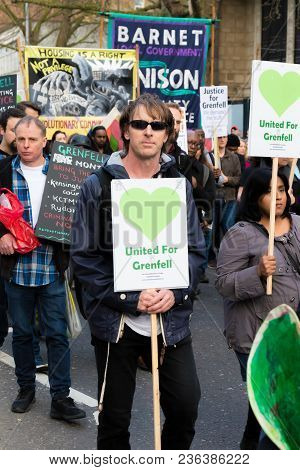 London, United Kingdom, 14th April 2018:- Marchers On A Silent March From Kensington Town Hall To Th