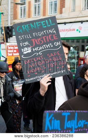 London, United Kingdom, 14th April 2018:- Marchers On A Silent March From Kensington Town Hall To Th