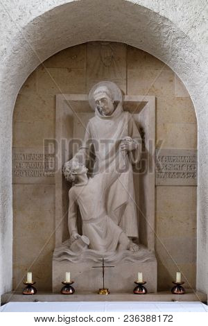 MUNSTERSCHWARZACH, GERMANY - JULY 09: Saint Mauro rescues young Placidus from drowning, altar in Munsterschwarzach Abbey, Benedictine monastery, Germany on July 09, 2017.